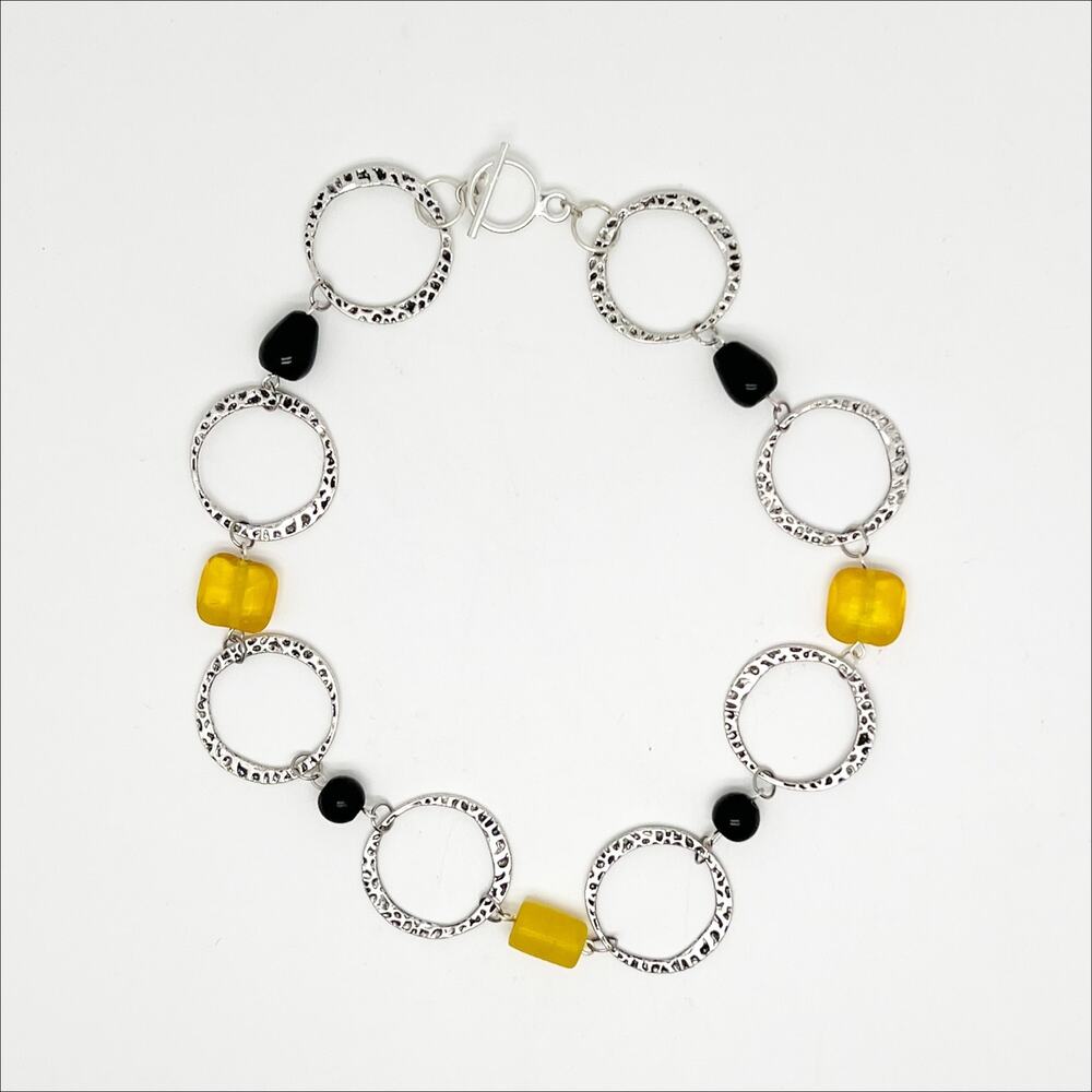 Handmade Silver Tone Hammered Circle Necklace with Black & Yellow Bead Accents